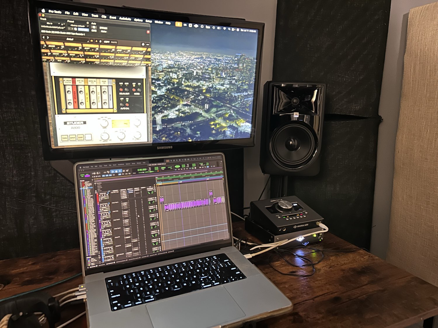 The Azalea Studios recording desk: Pro Tools with the UAD Studer A800, a session on the laptop, a JBL studio monitor, and the Universal Audio Apollo interface